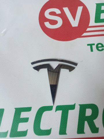 Емблема капота 149494900A TESLA