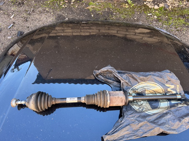 Привід передній правий 31607597694 BMW