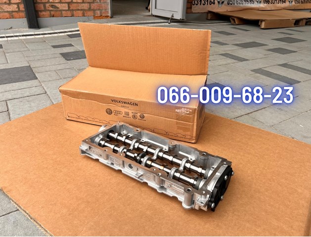 Вал розподільний 04L103044AG VAG