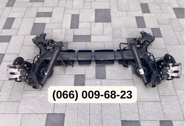 Амортизатор задній 562103341R RENAULT