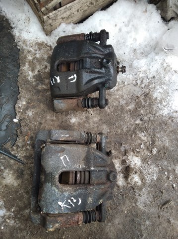 Супорт тормзной 410111HA0B NISSAN