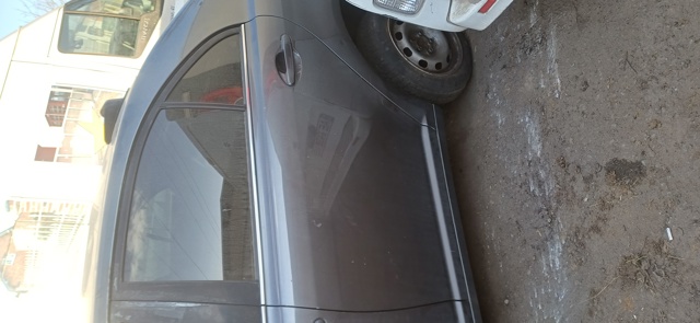 Скло заднє ліве 6810405100 TOYOTA