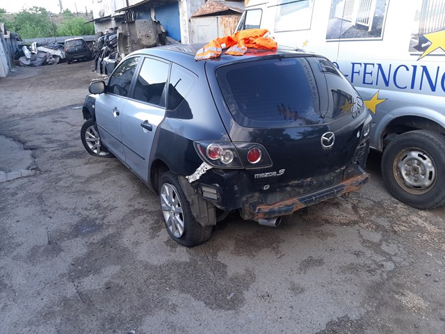 Скло багажного відсіку, ліве BP4K63950B MAZDA