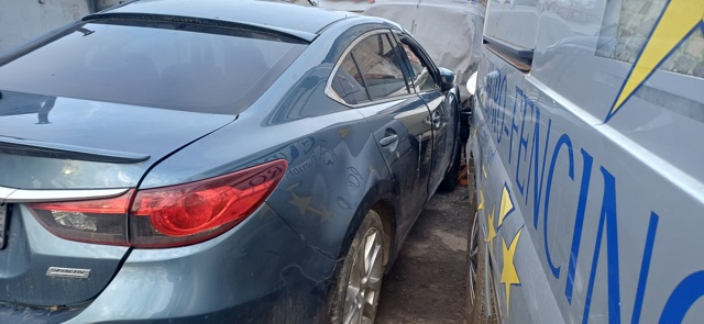 Скло автомобільне заднє GHK563930A MAZDA