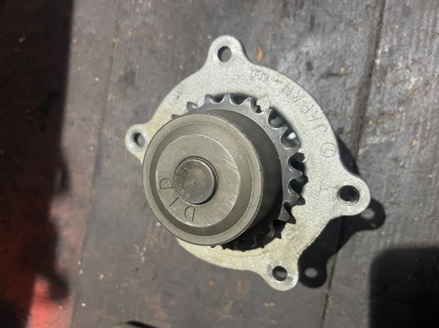 Насос системи охолодження 21110AA360 SUBARU