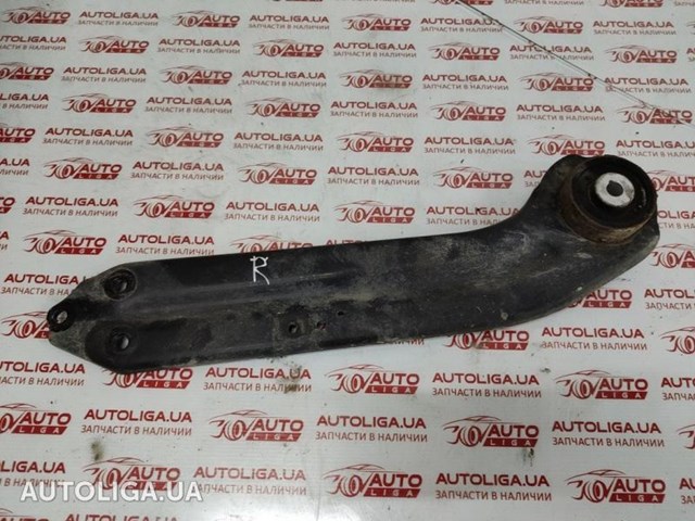 Важіль/тяга задньої підвіски подовжній нижній, правий 23269736 GM