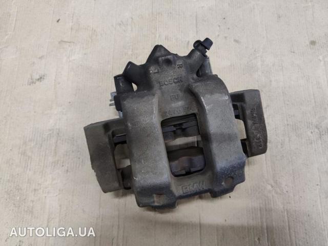 Супорт гальмівний, передній, правий 34116850970 BMW