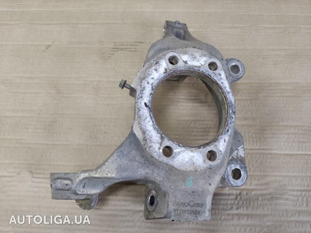 Цапфа поворотна права 40014JA00A NISSAN