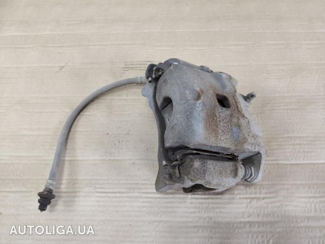 Супорт гальмівний, передній, правий 410013TA0A NISSAN