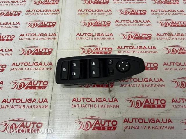 Кнопки переднього лівого склопід'ємника 61319362116 BMW
