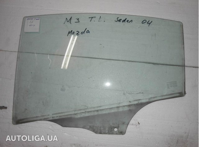 Скло заднє ліве BAN673511 MAZDA