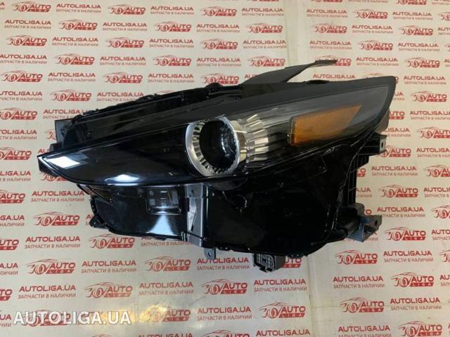Основна фара в зборі ліва DGH951040A MAZDA