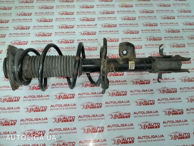 Ліва передня стійка E43031KA1A NISSAN