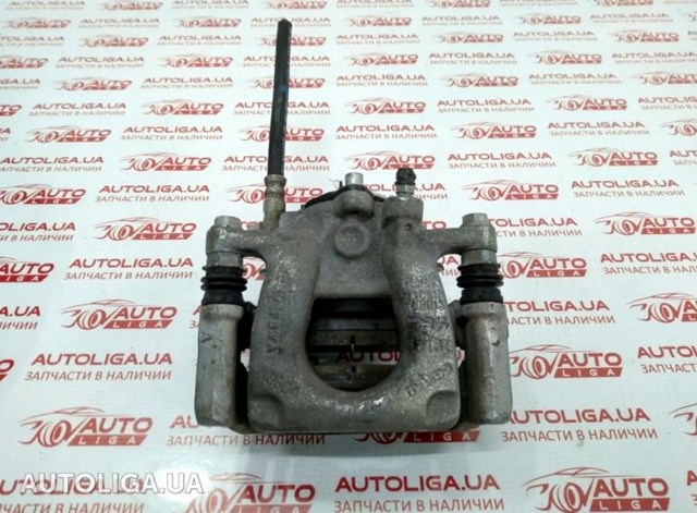 Супорт гальмівний задній правий GMY02661X MAZDA
