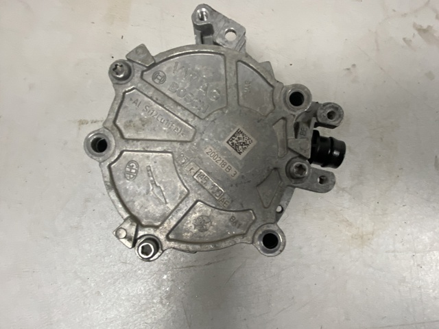 Насос вакуумний 06K145100AE VAG