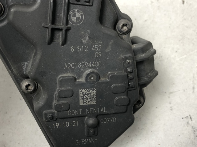Блок дросельної заслінки 13548512452 BMW