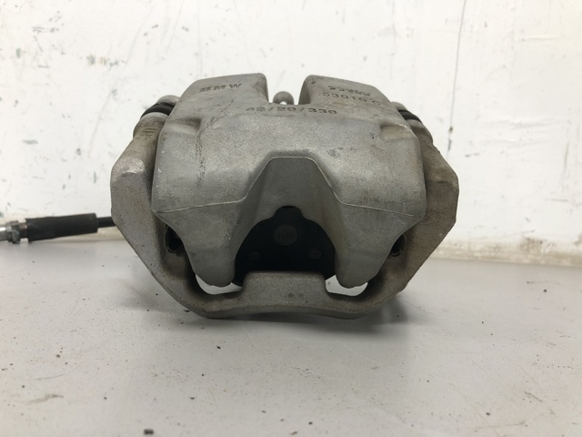 Супорт гальмівний задній правий 34216887386 BMW