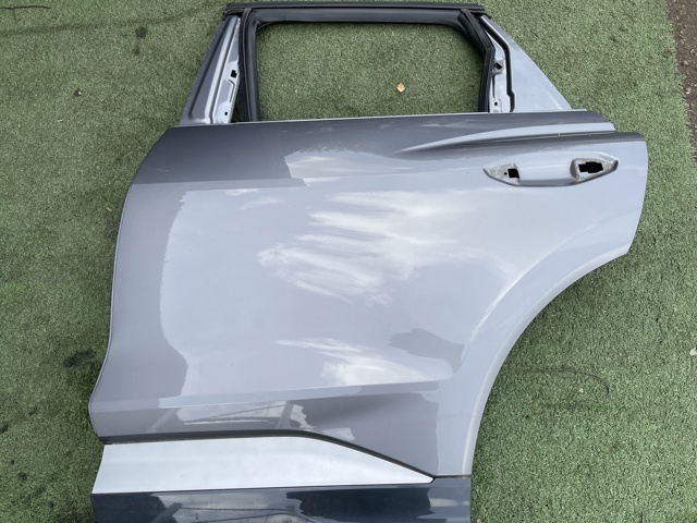 Двері пасажирськи задні ліві 89A833051 VAG