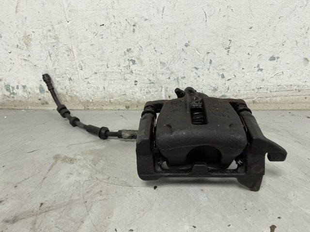 Супорт гальмівний задній правий 8K0615404E VAG