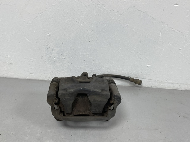 Задній гальмівний супорт лівий 8W0615403M VAG