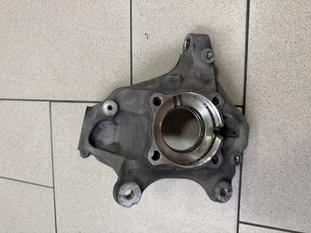 Цапфа поворотного кулака 31216876853 BMW