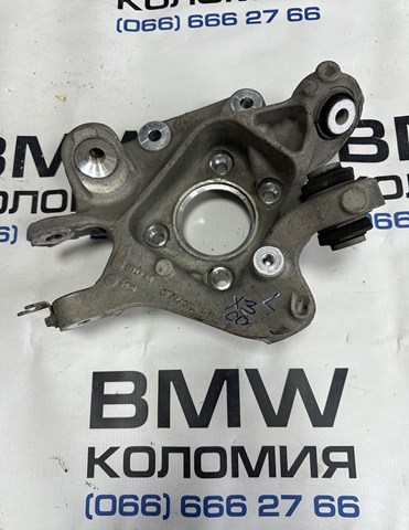 Цапфа поворотна ліва 33306871027 BMW