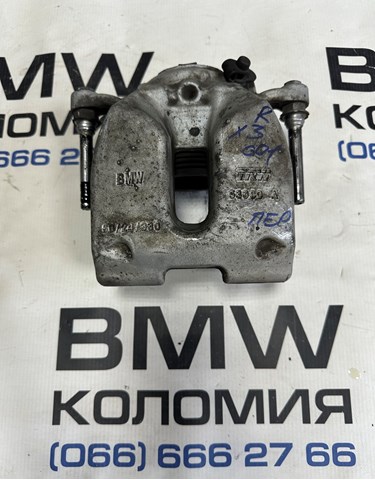 Супорт гальмівний, передній, правий 34106882254 BMW
