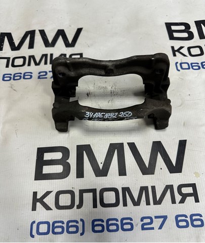 Скоба супорта переднього 34106882260 BMW