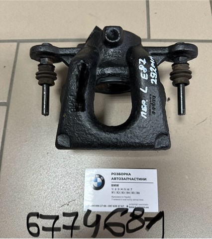Супорт гальмівний, передній, лівий 34116774681 BMW