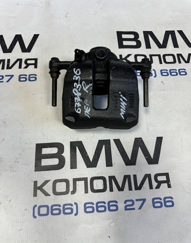 Супорт гальмівний, передній, правий 34116778336 BMW