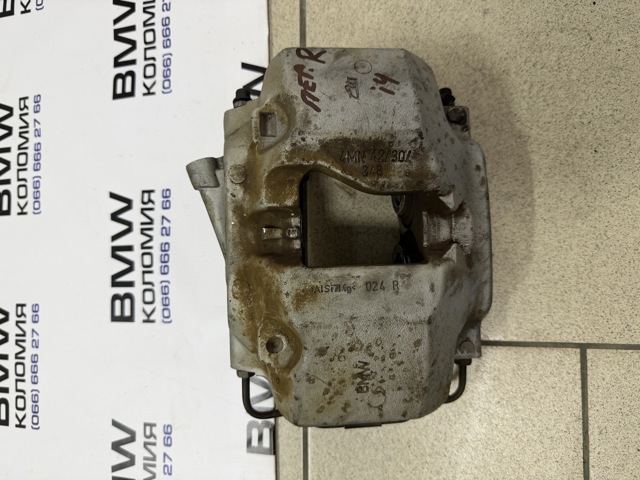 Супорт гальмівний, передній, правий 34116883484 BMW