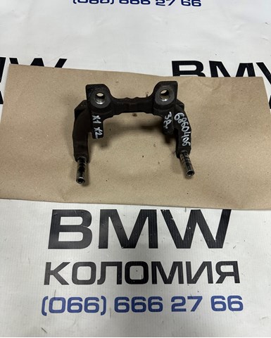 Скоба гальмівного заднього супорта 34206860406 BMW