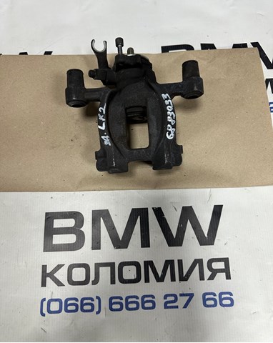 Задній гальмівний супорт лівий 34206883033 BMW