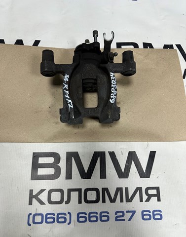 Супорт гальмівний задній правий 34206883034 BMW