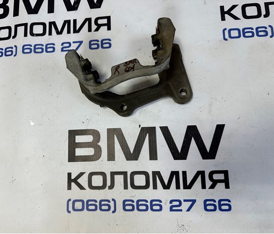 Скоба гальмівного заднього супорта 34206887388 BMW