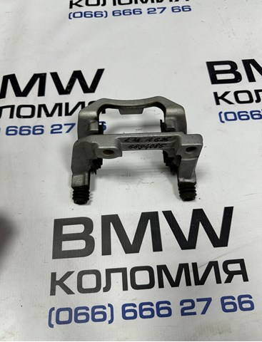 Скоба гальмівного заднього супорта 34206894085 BMW