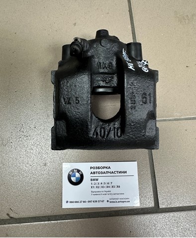 Задній гальмівний супорт лівий 34216758127 BMW
