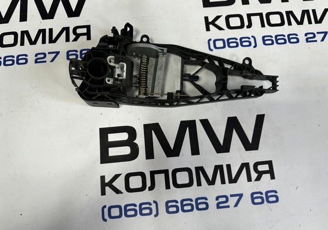 Тримач зовнішньої ручки дверей, задніх лівих 51217293185 BMW