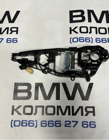 Тримач зовнішньої ручки дверей, задніх лівих 51217401209 BMW