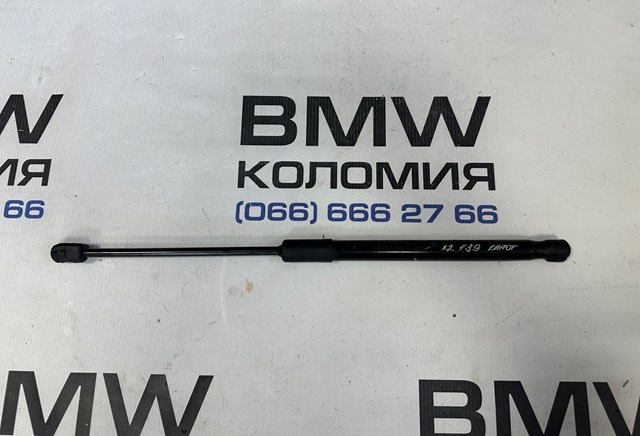 Амортизатор капота 51237424766 BMW