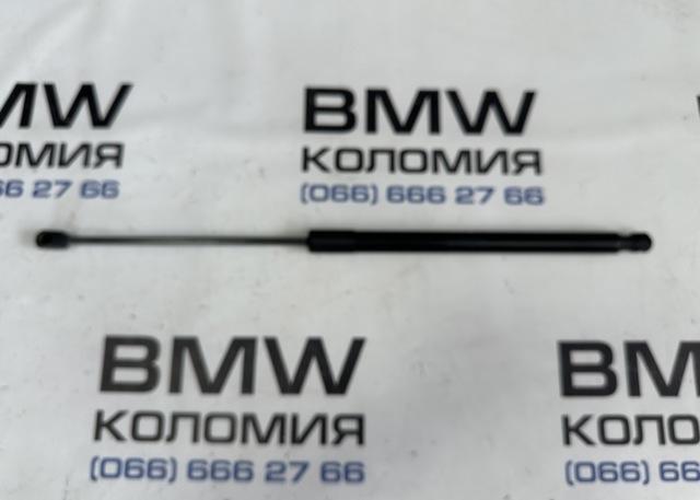 Амортизатор багажника лівий 51242990136 BMW
