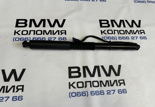 Амортизатор багажника правий 51247397322 BMW