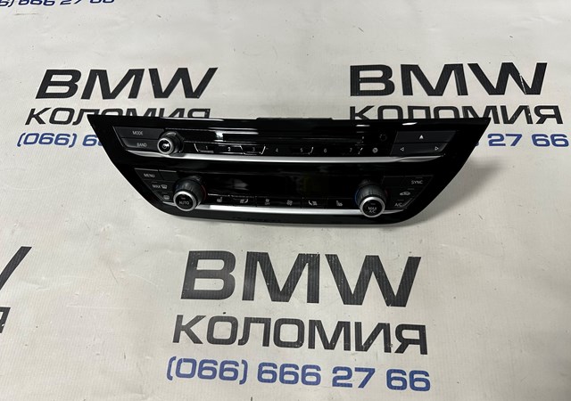 Блок управління кондиціонером 64117947701 BMW