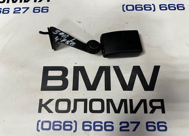 Важіль фіксатор ременя безпеки задній лівий 72117375445 BMW