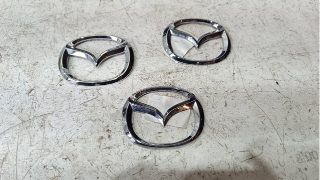 Емблема на кришку багажника, фірм.значок KB7W51731 MAZDA