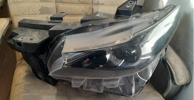 Блок фара ліва TA0N51041C MAZDA
