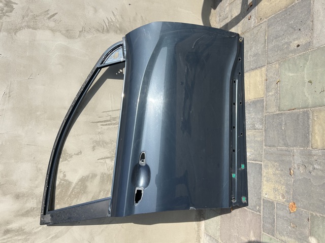 Пасажирські передні двері 76004J9000 HYUNDAI