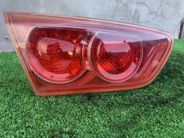 Задня ліва внутрішня фара 8337A063 MITSUBISHI