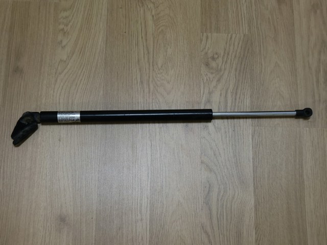 Амортизатор двері 3/5-ї задньої EG2162620D MAZDA