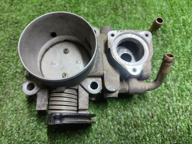 Дросільна заслінка в зборі MN153310 MITSUBISHI